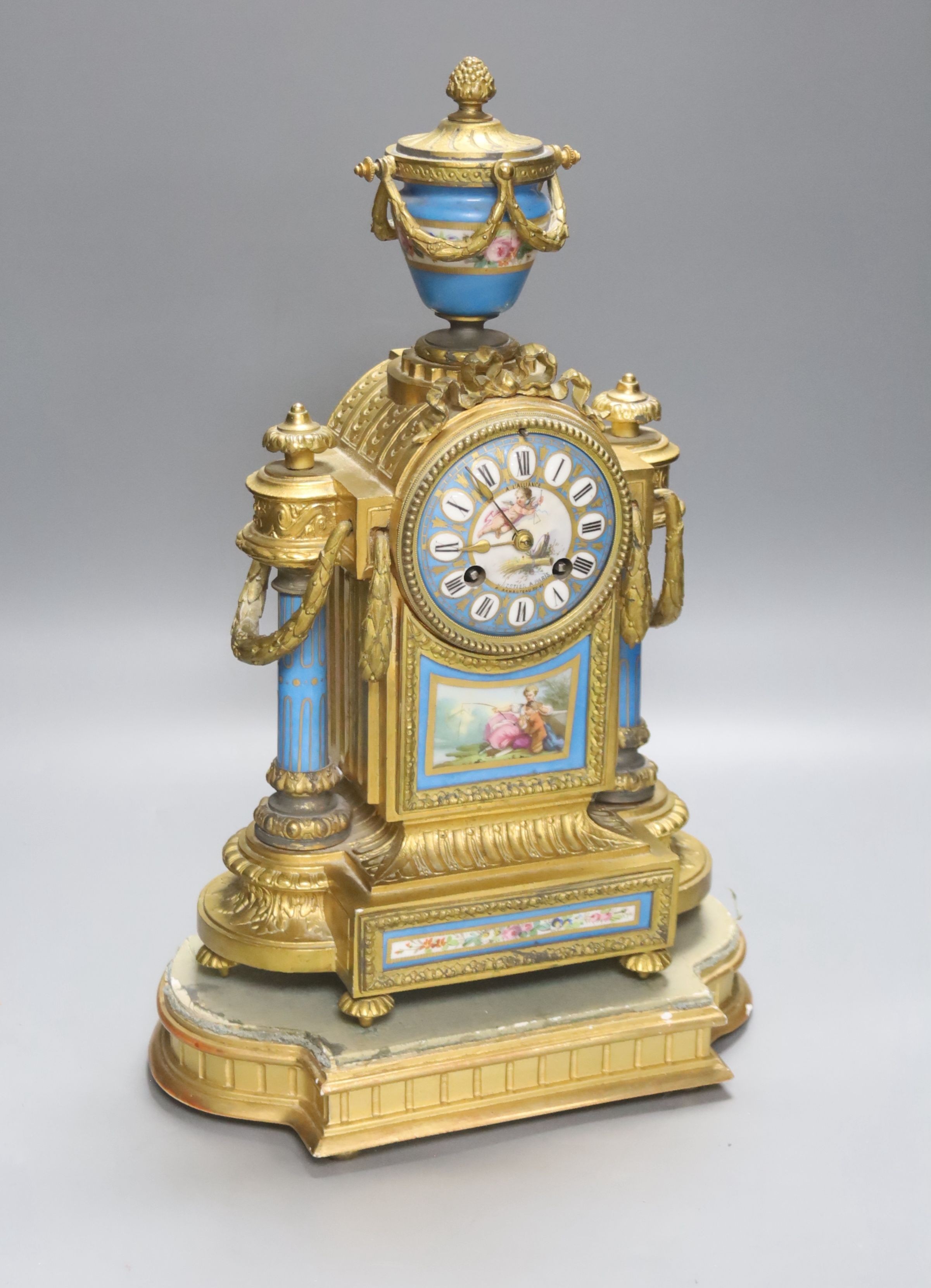 A late 19th century French gilt metal and porcelain mounted mantel clock, Japy freres movement countwheel striking on a bell, on plinth, height 44cm
